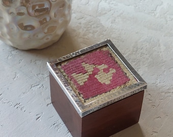 Small Peruvian handmade lidded square wooden trinket box with antique textile edged with a sterling silver border