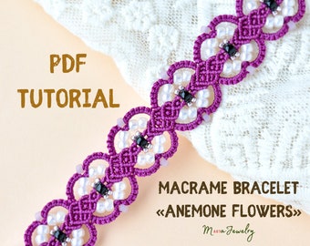 May include: PDF tutorial for a macrame bracelet with an anemone flower design. The bracelet is made with purple cord and white beads, and features black beads in the centre of each flower.