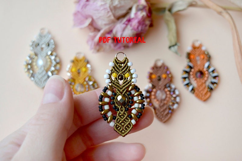 May include: Five beaded owl earrings in various colors, including gold, brown, white, black, and orange. The earrings are made with small beads and have a detailed design. The text "PDF TUTORIAL" is visible in the image.