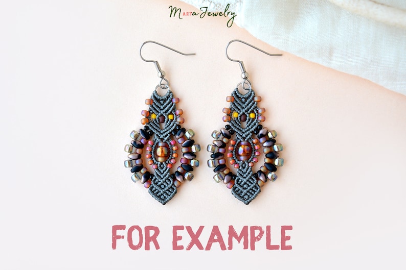 May include: Gray macrame earrings with black, brown, and iridescent beads. The earrings feature a geometric design with a central focal bead.