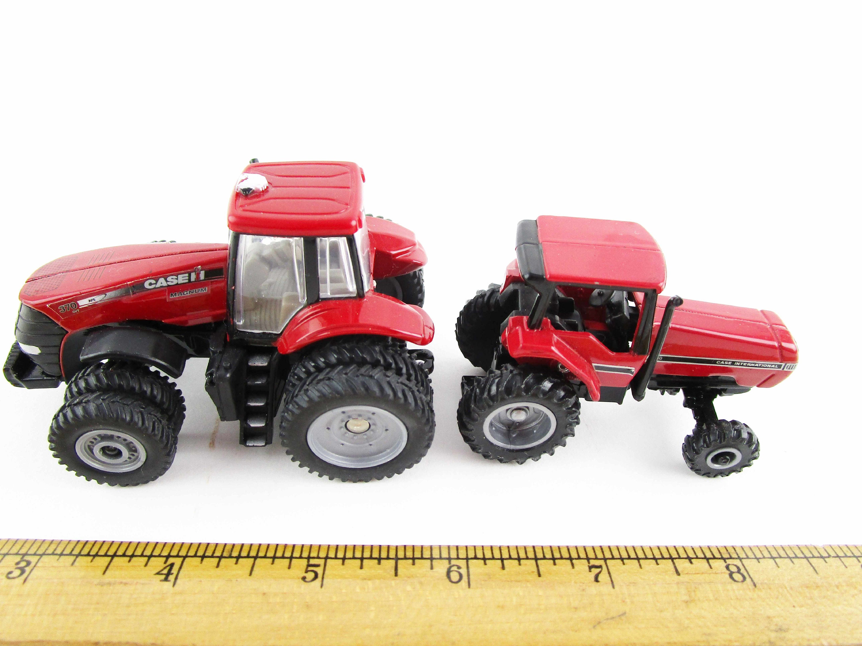 Two Case International Tractors - 1:64 Scale - Ertl Two Case International Tractors - 1:64 Scale - Ertl