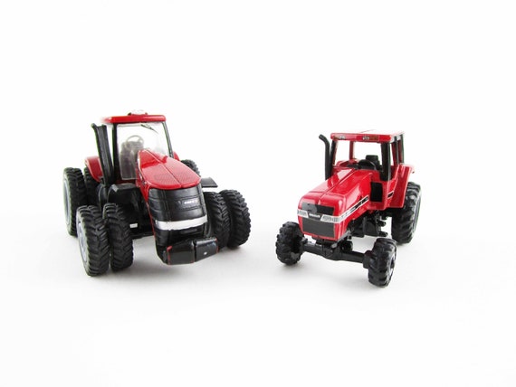Two Case International Tractors - 1:64 Scale - Ertl Two Case International Tractors - 1:64 Scale - Ertl