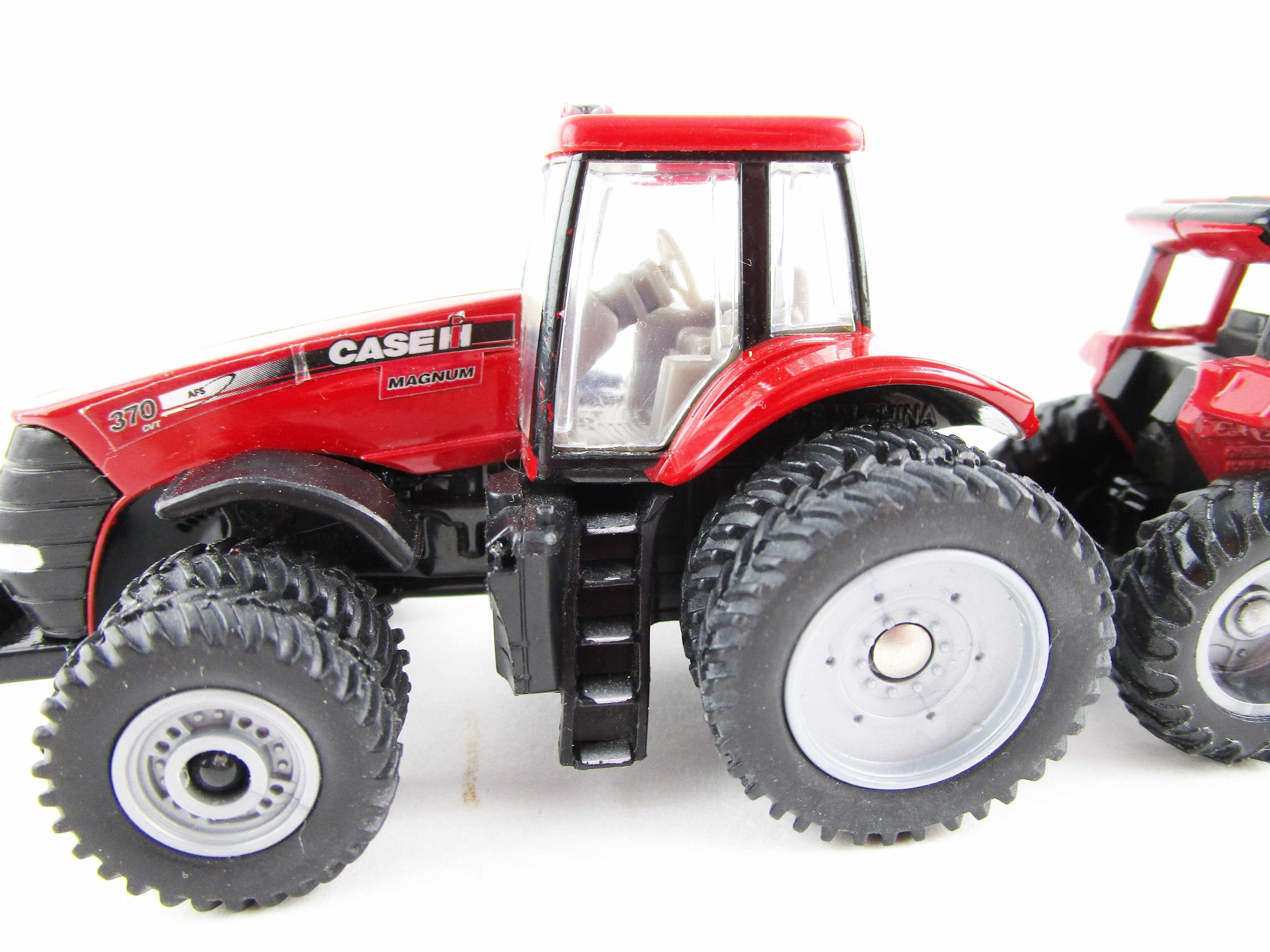 Two Case International Tractors - 1:64 Scale - Ertl