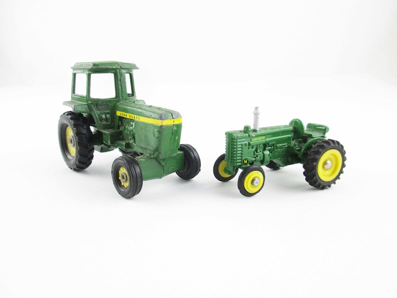 Metal Toy Tractors >> Two John Deere Miniatures 1 64 Scale Tractors Metal Toy Tractor And M Model Tractor Ertl Dyersville Iowa Collectible Farm Metal Toy Tractors >> Two John Deere Miniatures 1 64 Scale Tractors Metal Toy Tractor And M Model Tractor Ertl Dyersville Iowa Collectible Farm