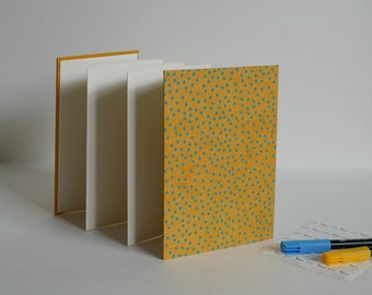 Yellow and blue polka dot album, accordion photo album, 12.5x17.5 cm, 14 white pages.