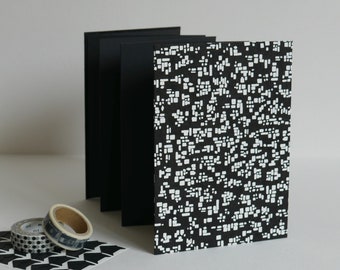 Accordion photo album, 12.5x17.5 cm, 14 black pages. Nepalese paper, graphic pattern, black and white