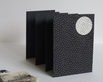 Moon album, black and white accordion photo album, 12.5 x 17.5 cm, 14 black pages.