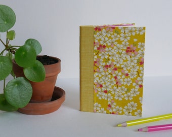 Notebook, sketchbook, 10x15 cm, 40 blank pages. Japanese paper cover, cherry blossoms, yellow