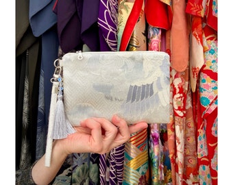 Clutch purse made from silver grey vintage obi silk with Phoenix woven design | detachable strap & tassel charm with moonstone glass beads