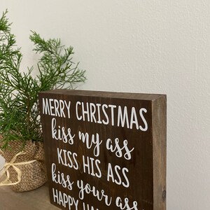 Christmas vacation quote sign - kiss my ass kiss your ass kiss his ass happy Hanukkah - funny Christmas movie signs - Clark Griswold Quote image 2