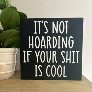 It’s not hoarding if your shit is cool - funny home decor - desk sign - office humor - collector quote