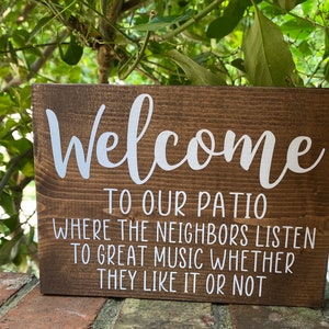 Welcome to our patio where the neighbors are listening to great music whether they like it or not - backyard deck sign - summer decor