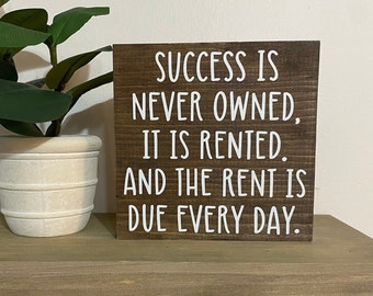 Success is never owned.It is rented and the rent is due every day sign - motivational quote - desk signs - home gym inspiration