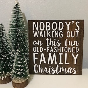 christmas vacation sign - nobodys walking out on this fun old fashioned family christmas - funny Christmas movie sign