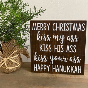 Christmas vacation quote sign - kiss my ass kiss your ass kiss his ass happy Hanukkah - funny Christmas movie signs - Clark Griswold Quote image 1