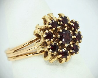 Estate 18K solid gold garnet ring Late Victorian era dinner ring Floral design Haloed natural gemstones