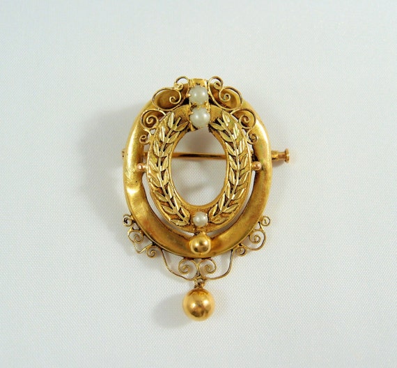 Late Victorian stamped 18K solid gold medallion br