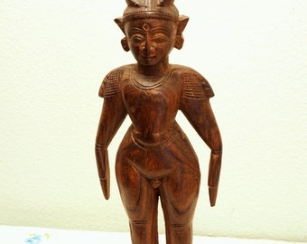 Beautiful hand carved hard wood Indian figurine. Exquisite details
