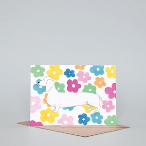 Biglietto d'auguri con fiore bassotto