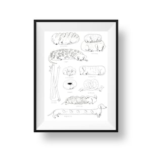 May include: Black framed art print featuring a whimsical illustration of dachshund dogs shaped like various types of bread, including a baguette, pretzel, and croissant. The print includes the names of each bread type.