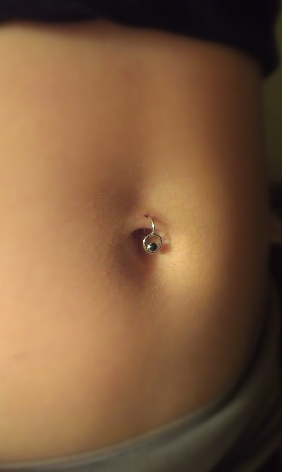 Belly button ring closed up deals