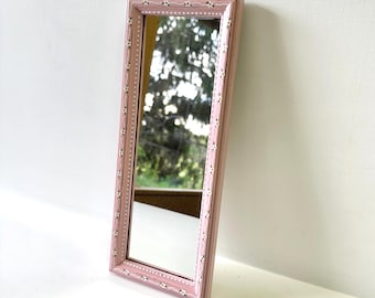 Vintage hand-painted pink wood framed mirror with floral border