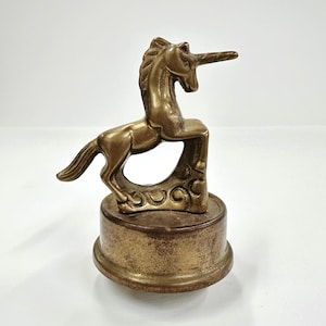 Vintage brass musical rotating unicorn figurine