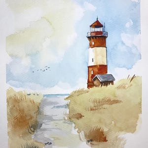 May include: Watercolour painting of a lighthouse with a red and white tower, a small building, and a path to the sea. The sky is blue with soft clouds, and the foreground shows grassy dunes. Signed by Benjamin A.