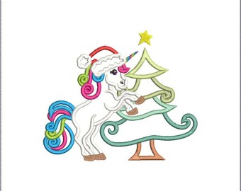 May include: A whimsical embroidered design featuring a white unicorn wearing a Santa hat, with a colorful mane and tail. The unicorn is next to a Christmas tree, topped with a yellow star. The design is on a white background.