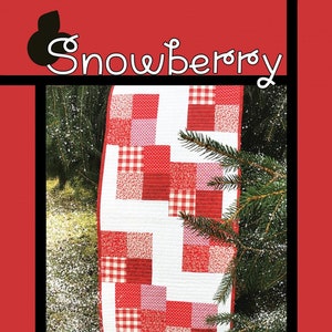 May include: A red and white patchwork quilt table runner with a gingham pattern. The runner is called "Snowberry" and is designed by Tricia Lynn Maloney for Villa Rosa Designs.