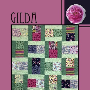 May include: A patchwork quilt with the name "GILDA" in large letters at the top. The quilt features a grid pattern of various floral and patterned fabrics in shades of pink, green, and blue. The words "Villa Rosa Designs" are at the bottom.