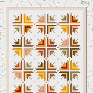 May include: A quilt pattern titled Fancy Schmancy by Wendy Sheppard, featuring a repeating geometric block design in shades of red, orange, yellow, brown, and pink on a white background. The finished quilt size is 55 inches by 71 inches.