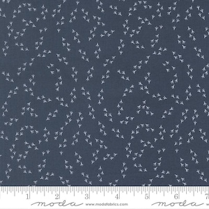 May include: Dark blue fabric with a repeating pattern of small white bird tracks. The fabric has a textured appearance and is suitable for quilting or other craft projects. A ruler is at the bottom of the image.