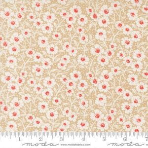 May include: Tan fabric with a repeating floral pattern. White daisy-like flowers with red centers are scattered across the fabric. The background has a subtle dotted texture. The fabric is measured in inches.