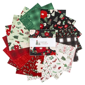 May include: A stack of square fabric swatches arranged in a fan pattern, featuring Christmas-themed prints in red, green, black, and white. The center band displays the text Evergreen Wishes by Tara Reed with a small tree and gift graphic.