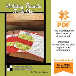 May include: Holiday Bauble Snack Mat PDF digital file. The image shows two quilted snack mats with a bauble design in red, green, and white. The mats have a red border and white quilted background. The text on the image says "Holiday Bauble Snack Mat".