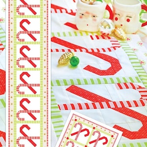 May include: A festive Christmas-themed table runner and placemat set with a candy cane design. The white fabric features red candy cane accents and green stripes. The text "Candy Cane Lane" is at the top.