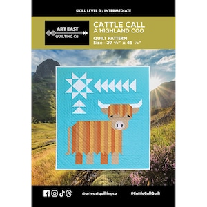 May include: A quilt pattern titled "Cattle Call A Highland Coo" with a turquoise background and a geometric design of a Highland cow. The quilt measures 39.75 x 45.25 inches. The pattern is by Art East Quilting Co.