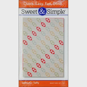 May include: A quilt pattern package titled Sweet & Simple with the text Quick. Easy. Fun. Done. The cover features a quilt design with diagonal rows of small squares in red, light green, and cream colors. The package states a quilt size of 54" x 78".