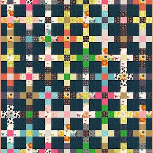 May include: A colorful patchwork quilt with a grid pattern. The quilt features squares of various patterns, including floral, polka dots, and cat silhouettes, in shades of pink, green, yellow, and blue. The background is a dark navy blue.