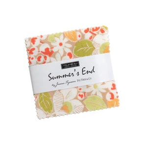 May include: A stack of fabric squares with a floral pattern in orange, green, and white on a beige background. The fabric is wrapped with a white band that reads "Summer's End" by Joanna Figueroa, Fig Tree & Co.
