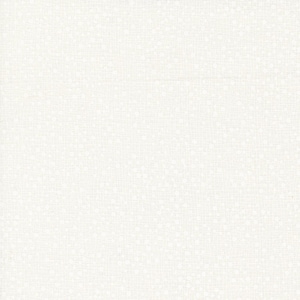 May include: Off-white fabric with a subtle, textured weave. The surface has a delicate pattern of tiny, irregular dots, creating a soft, visual texture. The overall effect is a clean, neutral background.