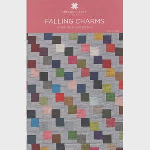 May include: A Missouri Star Quilt Co. Falling Charms quilt pattern booklet with a pink header and white text. The cover displays a gray quilt featuring a diagonal grid of multicolored square patches, measuring 83 inches by 96 inches.