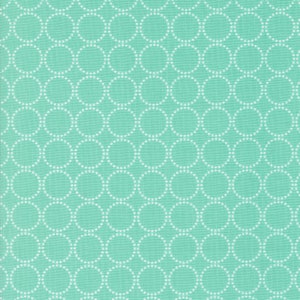 May include: A teal fabric with a repeating pattern of white dotted circles.