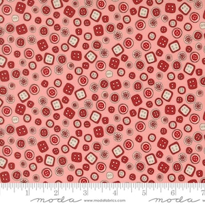 May include: A fabric with a repeating pattern of red and off-white buttons on a light pink background. The buttons vary in shape, including round and square, and are scattered across the fabric. The fabric is suitable for sewing and crafting projects.