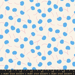 May include: Fabric with a repeating pattern of blue cherries with pink stems on a cream background. The text "RUBY STAR SOCIETY" is printed at the bottom of the image.