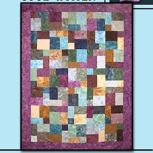 May include: A quilt pattern called "Cool Water" by Villa Rosa Designs. The quilt is made up of a patchwork of squares in various shades of blue, green, brown, and purple. The squares are arranged in a random pattern.