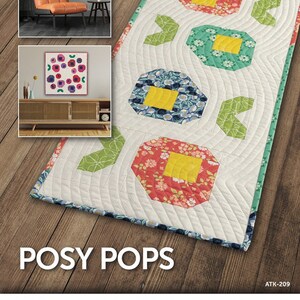 May include: A quilting pattern for a table runner called "Posy Pops" by Atkinson Designs. The pattern features a row of colorful flowers with a yellow center. The text "Posy Pops" and "ATK-209" are visible in the image.