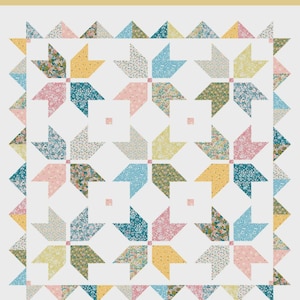 May include: A white quilt with a Quarter Star pattern, featuring floral and geometric designs in shades of pink, blue, yellow, and green. The quilt measures 76" x 76". The top of the image has the text "Amy Smart" and "Diary of a Quilter".