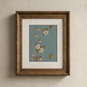 Peut inclure: Une œuvre d'art murale encadrée représentant une illustration botanique de fleurs délicates blanches et roses sur de fines branches brunes sur un fond bleu-vert sourd. L'œuvre est insérée dans un cadre en bois brun foncé avec un passe-partout crème.